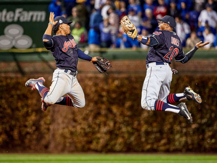 Francisco Lindor and Rajai Davis high-fiving